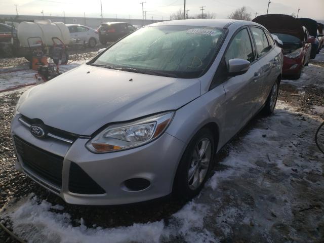 Photo 1 VIN: 1FADP3F24DL232957 - FORD FOCUS SE 