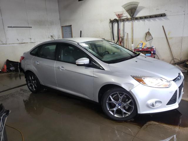 Photo 3 VIN: 1FADP3F24DL234613 - FORD FOCUS SE 