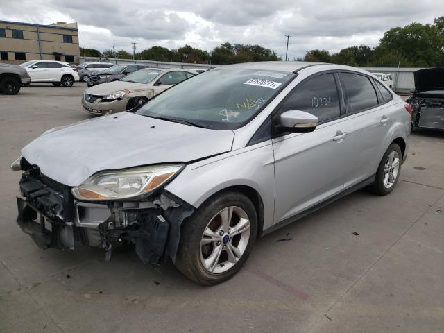 Photo 1 VIN: 1FADP3F24DL242937 - FORD FOCUS SE 