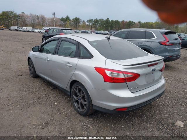 Photo 2 VIN: 1FADP3F24DL265599 - FORD FOCUS 