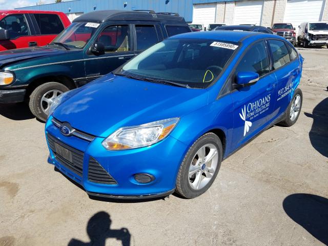 Photo 1 VIN: 1FADP3F24DL270625 - FORD FOCUS SE 