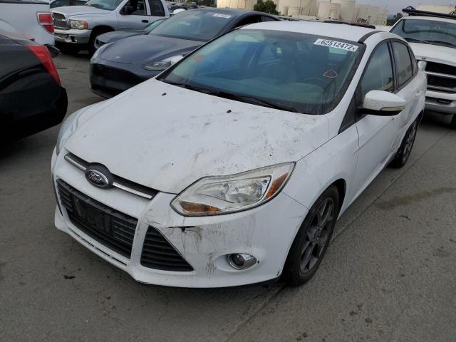 Photo 1 VIN: 1FADP3F24DL272004 - FORD FOCUS SE 