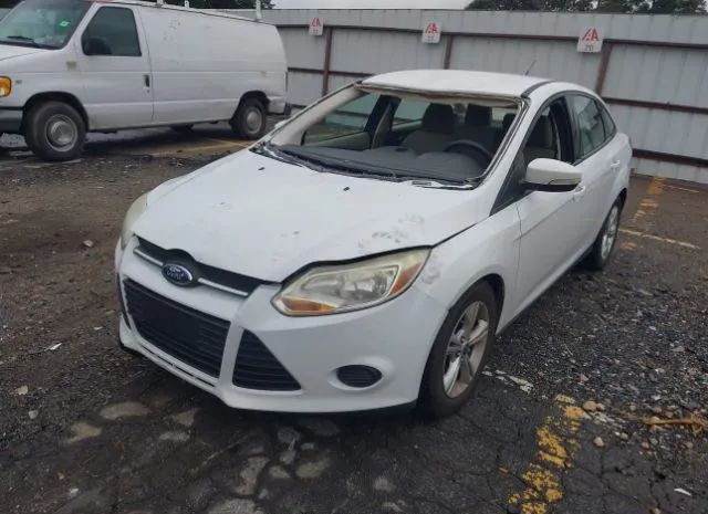 Photo 1 VIN: 1FADP3F24DL282564 - FORD FOCUS 