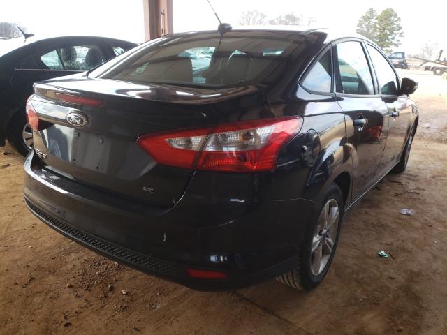 Photo 3 VIN: 1FADP3F24DL315062 - FORD FOCUS SE 