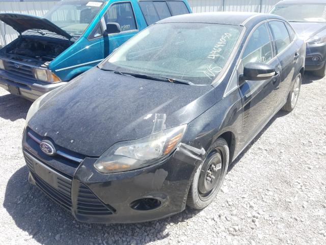 Photo 1 VIN: 1FADP3F24DL320729 - FORD FOCUS SE 