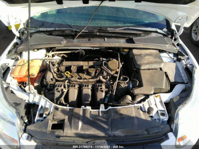 Photo 9 VIN: 1FADP3F24DL325705 - FORD FOCUS 