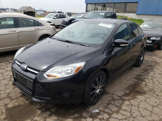 Photo 1 VIN: 1FADP3F24DL380526 - FORD FOCUS SE 