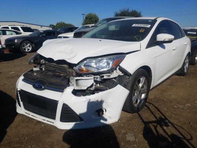 Photo 1 VIN: 1FADP3F24EL112786 - FORD FOCUS SE 