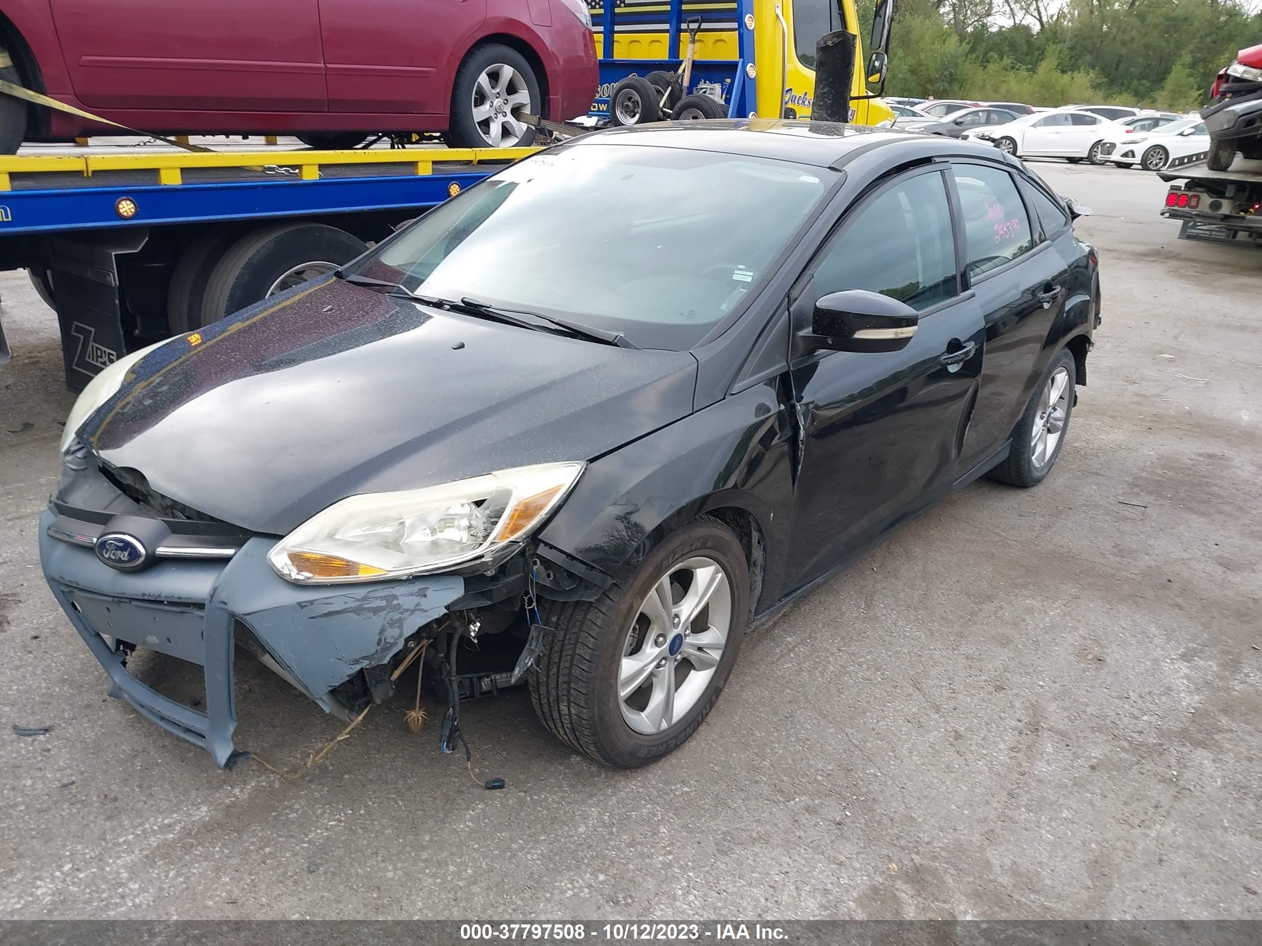 Photo 1 VIN: 1FADP3F24EL150700 - FORD FOCUS 