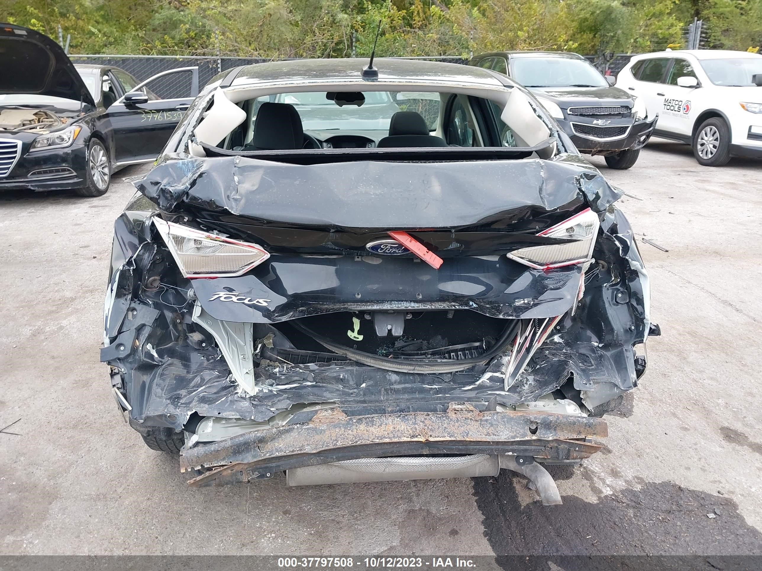 Photo 16 VIN: 1FADP3F24EL150700 - FORD FOCUS 