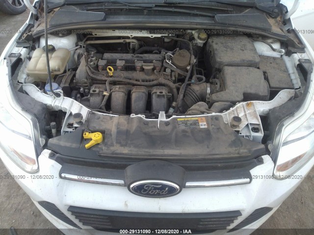 Photo 9 VIN: 1FADP3F24EL186421 - FORD FOCUS 