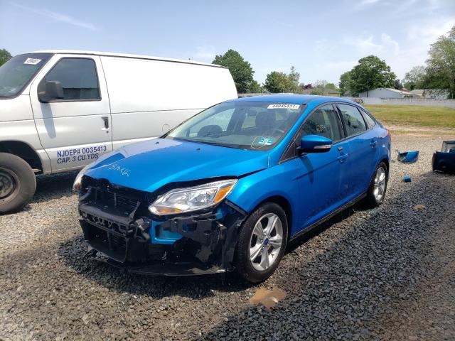 Photo 1 VIN: 1FADP3F24EL188511 - FORD FOCUS SE 