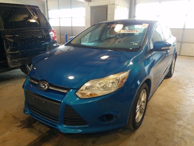 Photo 1 VIN: 1FADP3F24EL216596 - FORD FOCUS SE 