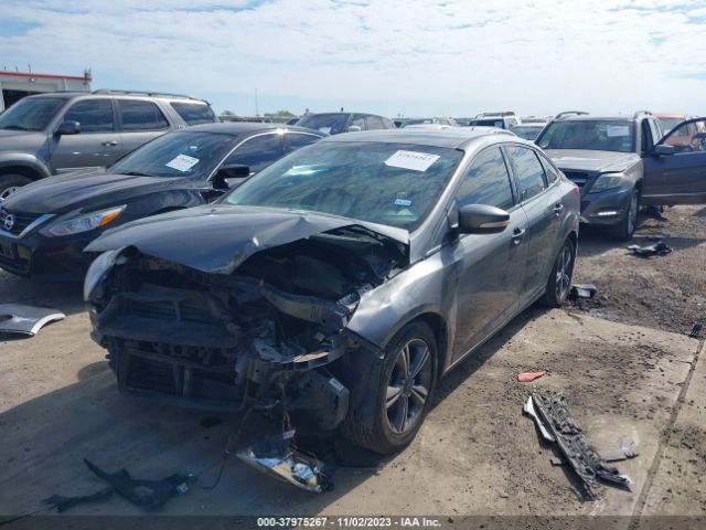 Photo 1 VIN: 1FADP3F24EL281058 - FORD FOCUS 