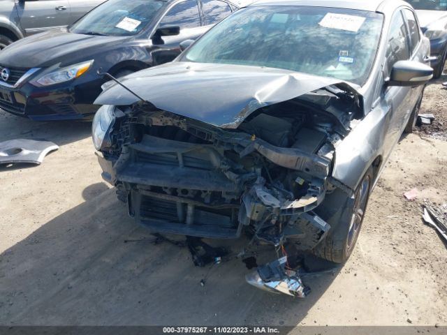 Photo 5 VIN: 1FADP3F24EL281058 - FORD FOCUS 