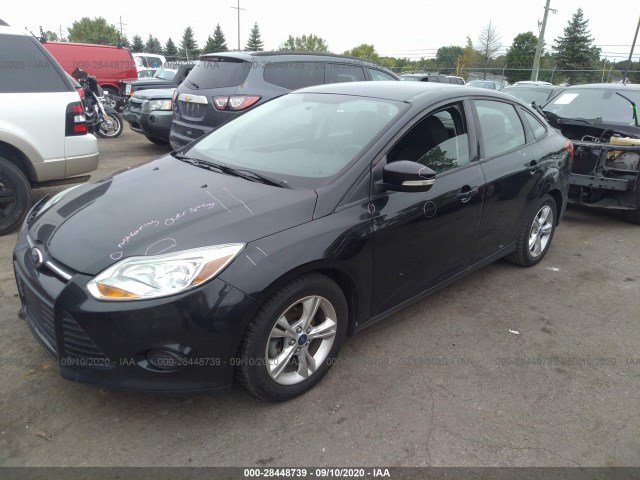 Photo 1 VIN: 1FADP3F24EL285997 - FORD FOCUS 