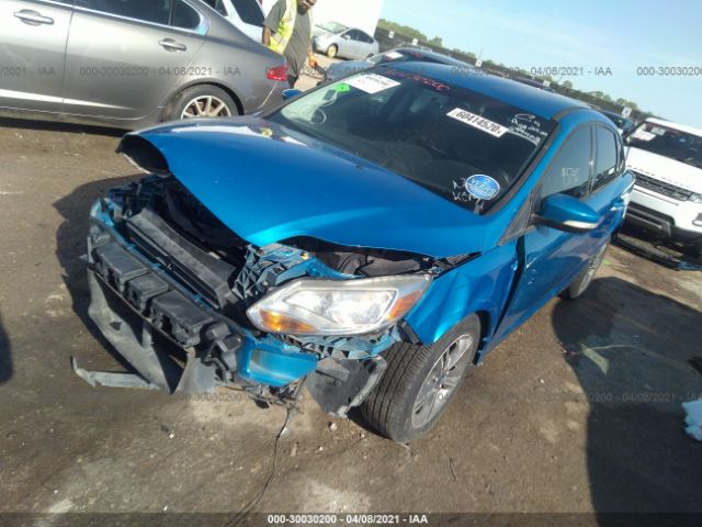 Photo 1 VIN: 1FADP3F24EL299463 - FORD FOCUS 