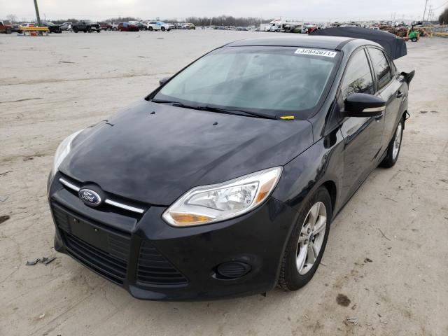 Photo 1 VIN: 1FADP3F24EL305634 - FORD FOCUS SE 