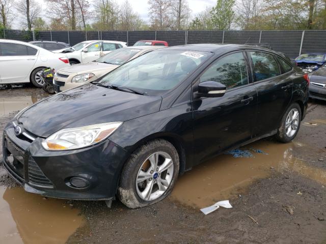 Photo 1 VIN: 1FADP3F24EL316021 - FORD FOCUS SE 