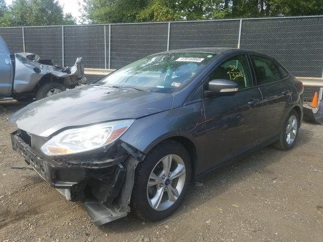 Photo 1 VIN: 1FADP3F24EL322093 - FORD FOCUS 