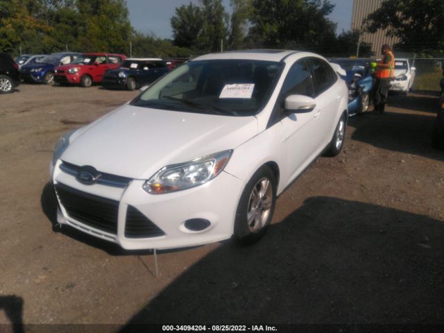 Photo 1 VIN: 1FADP3F24EL339122 - FORD FOCUS 