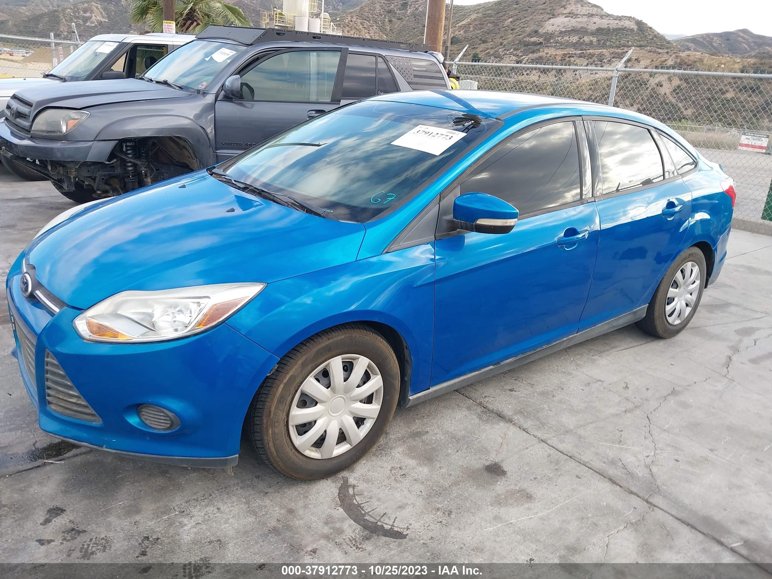 Photo 1 VIN: 1FADP3F24EL375330 - FORD FOCUS 