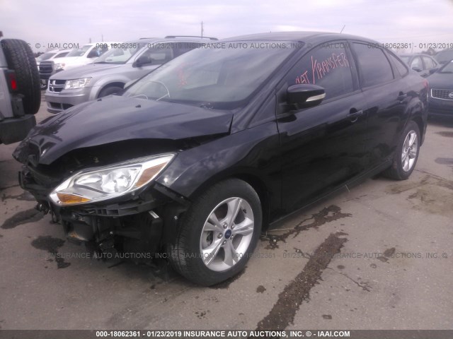 Photo 1 VIN: 1FADP3F24EL381032 - FORD FOCUS 