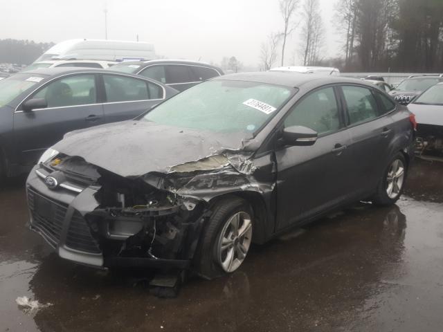 Photo 1 VIN: 1FADP3F24EL402610 - FORD FOCUS SE 