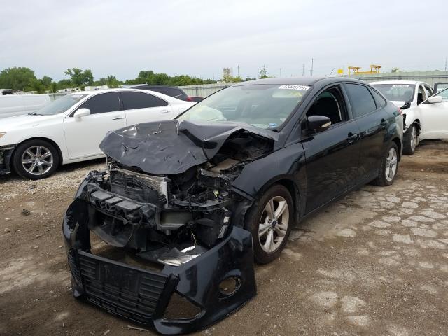 Photo 1 VIN: 1FADP3F24EL428432 - FORD FOCUS SE 