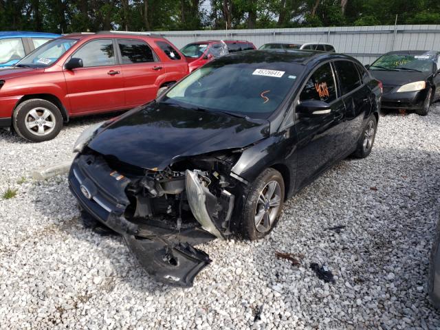 Photo 1 VIN: 1FADP3F24EL460443 - FORD FOCUS SE 