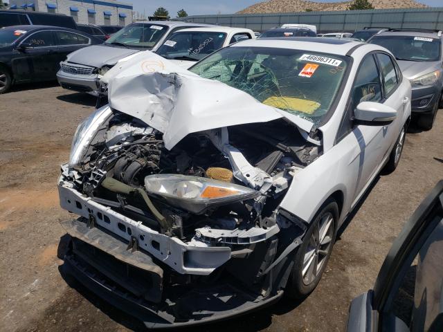 Photo 1 VIN: 1FADP3F24FL207706 - FORD FOCUS SE 