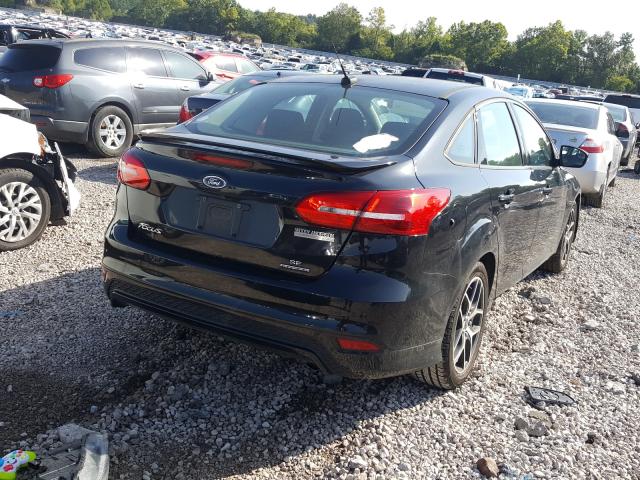 Photo 3 VIN: 1FADP3F24FL259370 - FORD FOCUS SE 