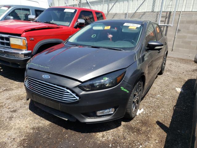 Photo 1 VIN: 1FADP3F24FL261569 - FORD FOCUS SE 