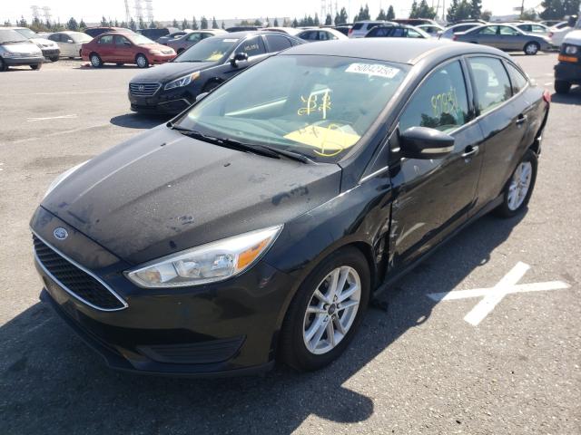 Photo 1 VIN: 1FADP3F24FL294510 - FORD FOCUS SE 