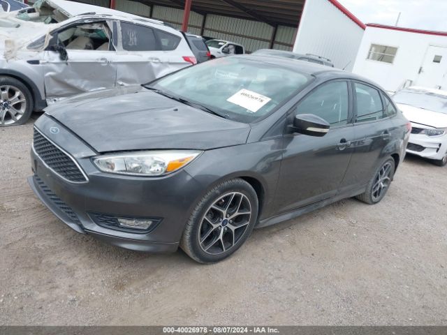 Photo 1 VIN: 1FADP3F24FL300029 - FORD FOCUS SE 