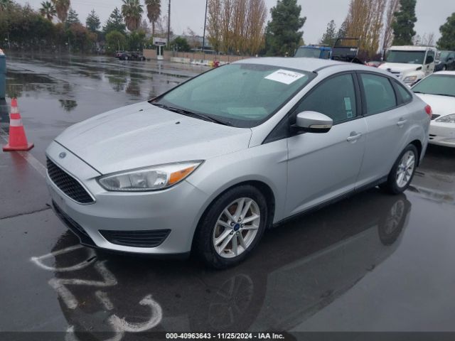 Photo 1 VIN: 1FADP3F24FL329109 - FORD FOCUS 