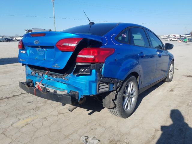 Photo 3 VIN: 1FADP3F24FL338831 - FORD FOCUS SE 