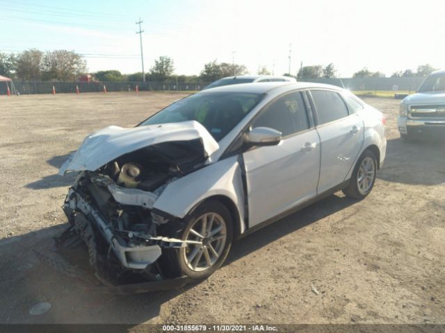 Photo 1 VIN: 1FADP3F24FL347657 - FORD FOCUS 