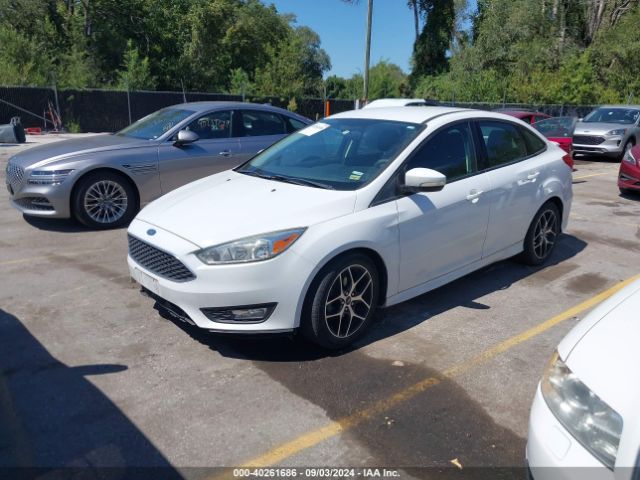 Photo 1 VIN: 1FADP3F24FL348226 - FORD FOCUS 