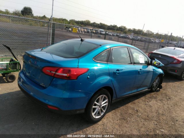 Photo 3 VIN: 1FADP3F24FL355547 - FORD FOCUS 