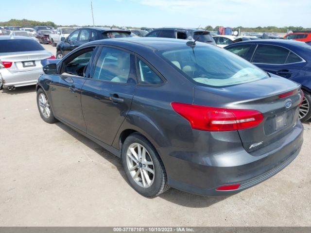 Photo 2 VIN: 1FADP3F24FL374387 - FORD FOCUS 