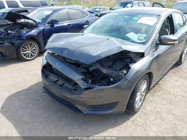 Photo 5 VIN: 1FADP3F24FL374387 - FORD FOCUS 