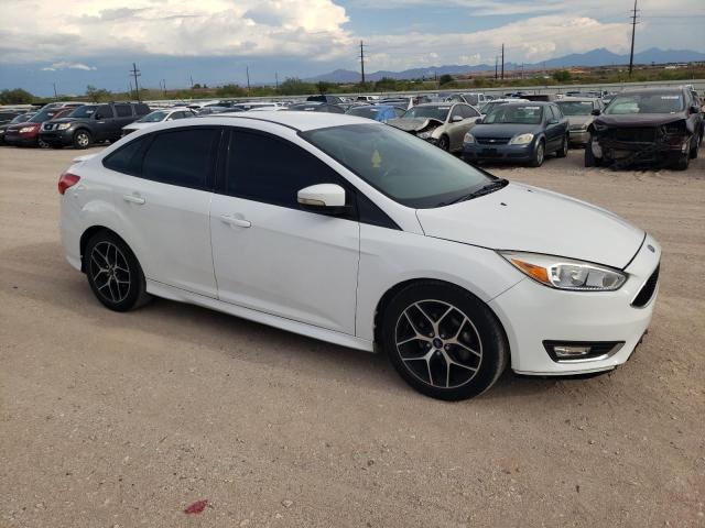 Photo 3 VIN: 1FADP3F24GL203611 - FORD FOCUS SE 