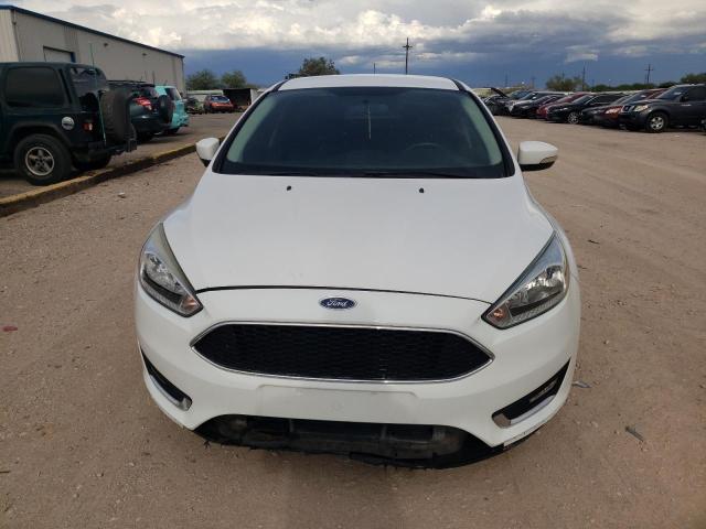 Photo 4 VIN: 1FADP3F24GL203611 - FORD FOCUS SE 