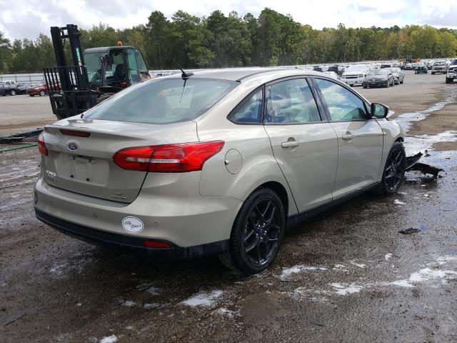 Photo 3 VIN: 1FADP3F24GL207142 - FORD FOCUS SE 