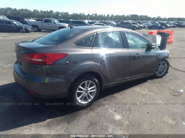 Photo 3 VIN: 1FADP3F24GL211109 - FORD FOCUS 