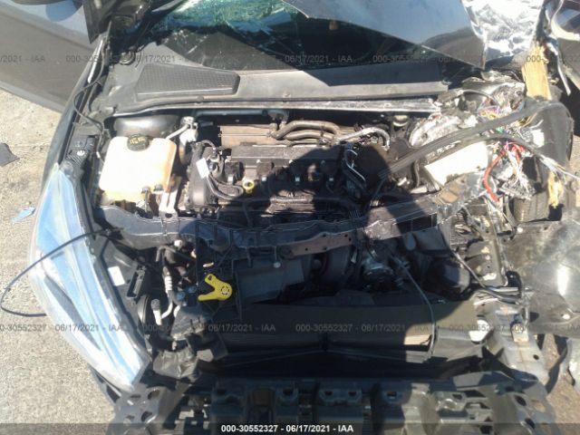 Photo 5 VIN: 1FADP3F24GL211109 - FORD FOCUS 