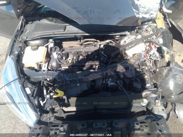 Photo 9 VIN: 1FADP3F24GL211109 - FORD FOCUS 