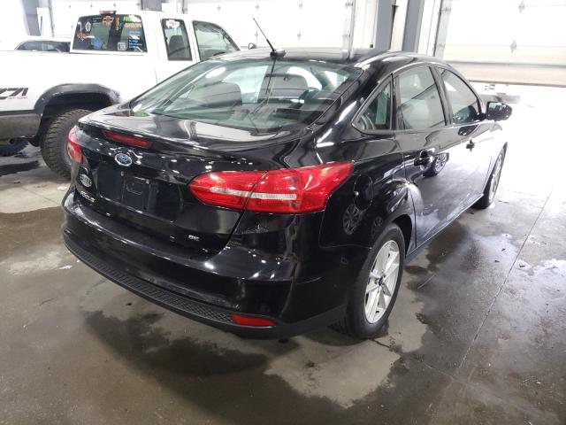 Photo 3 VIN: 1FADP3F24GL213801 - FORD FOCUS SE 