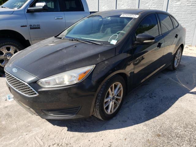 Photo 1 VIN: 1FADP3F24GL216729 - FORD FOCUS SE 